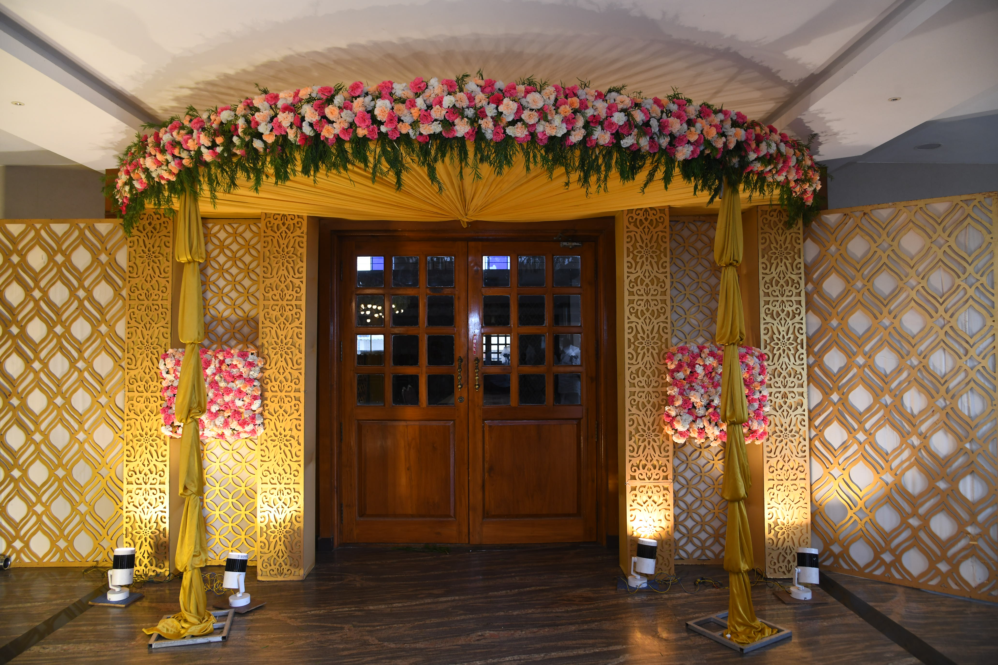 Elegant birthday celebration with themed decor and floral installations