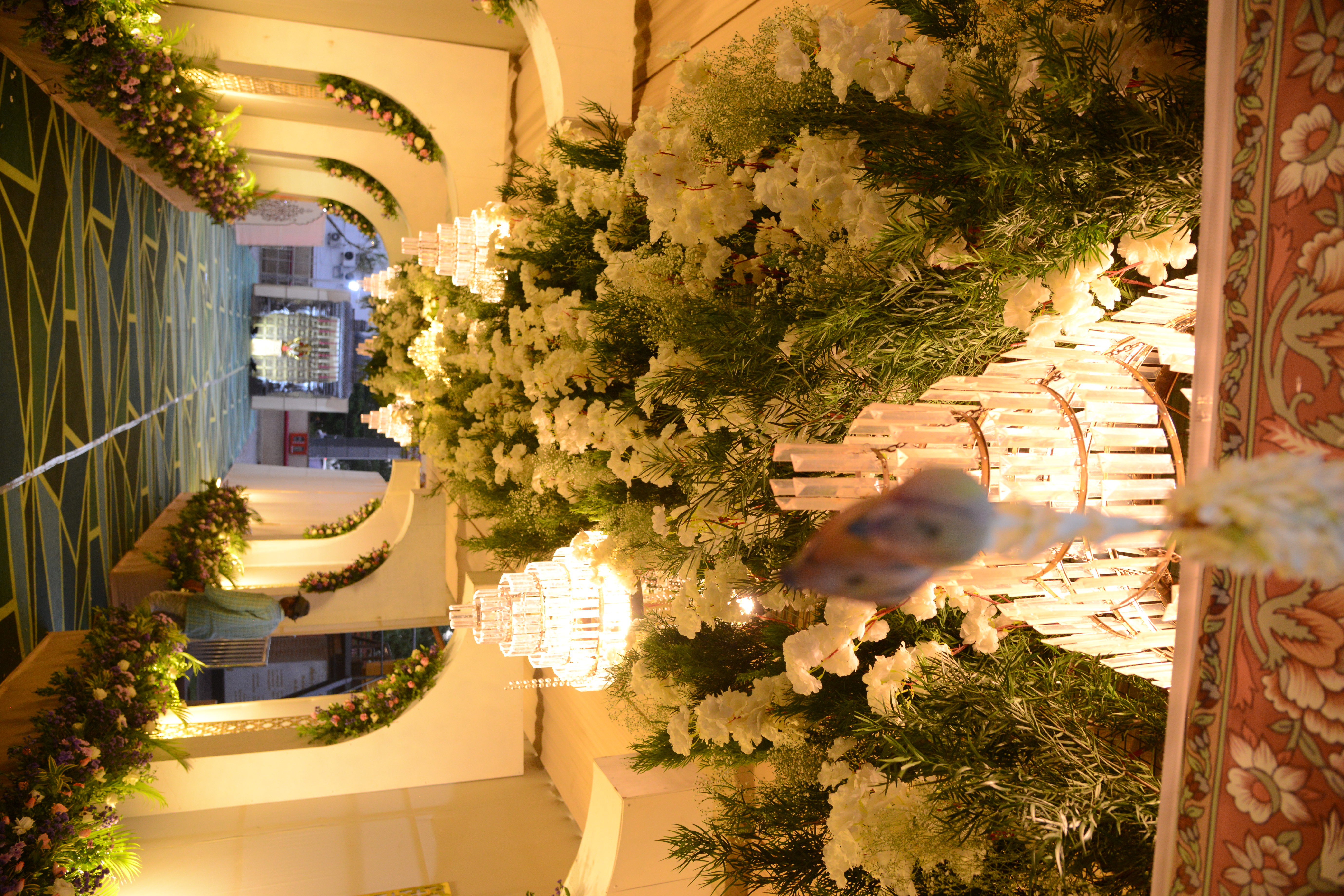 Grand entrance arch and floral installation for a corporate event